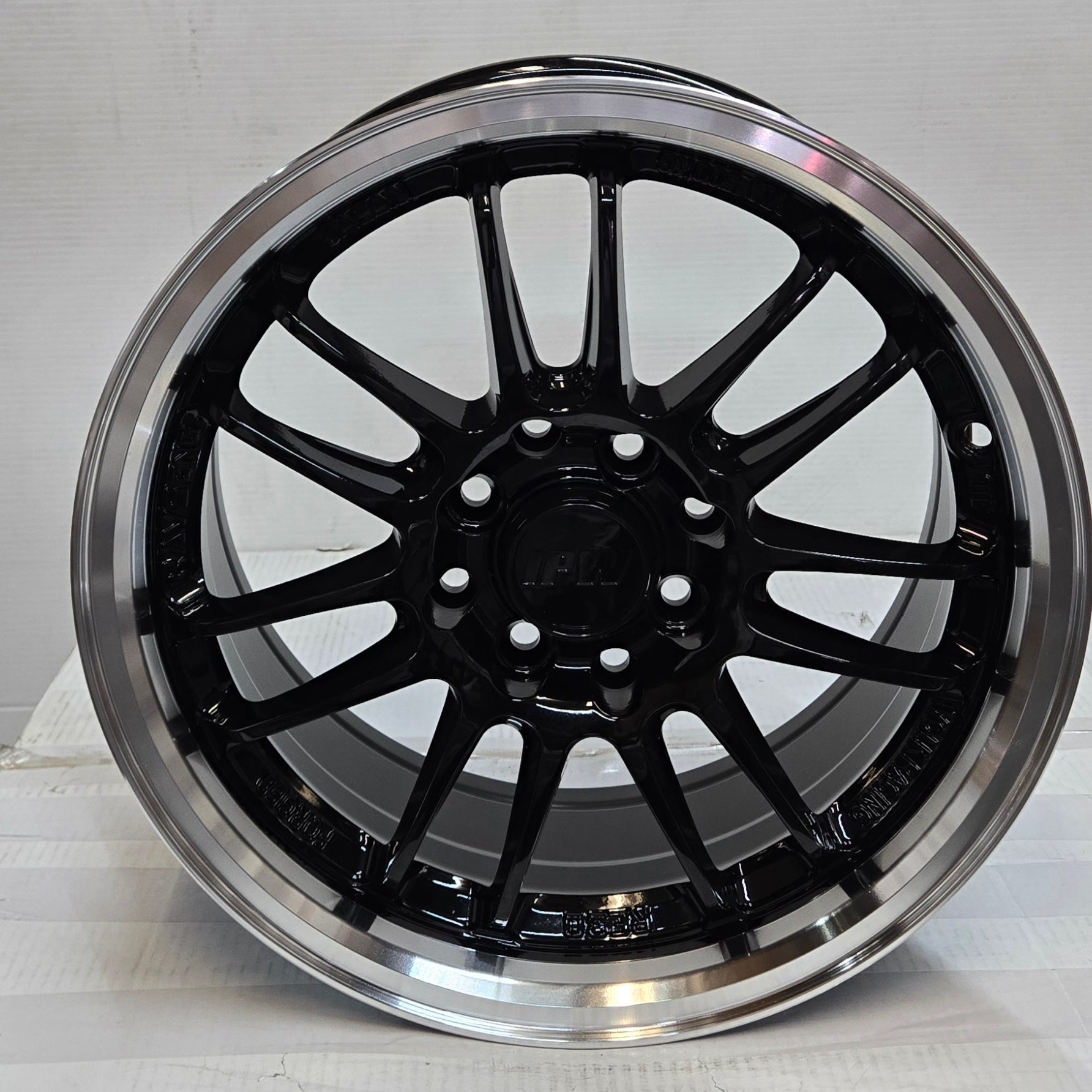 W560 15X7.5 4X100 4X114.3 BLACK MACHINED LIP - Gun Hill Tire House (WTW-WHOLESALE TIRES & WHEELS)