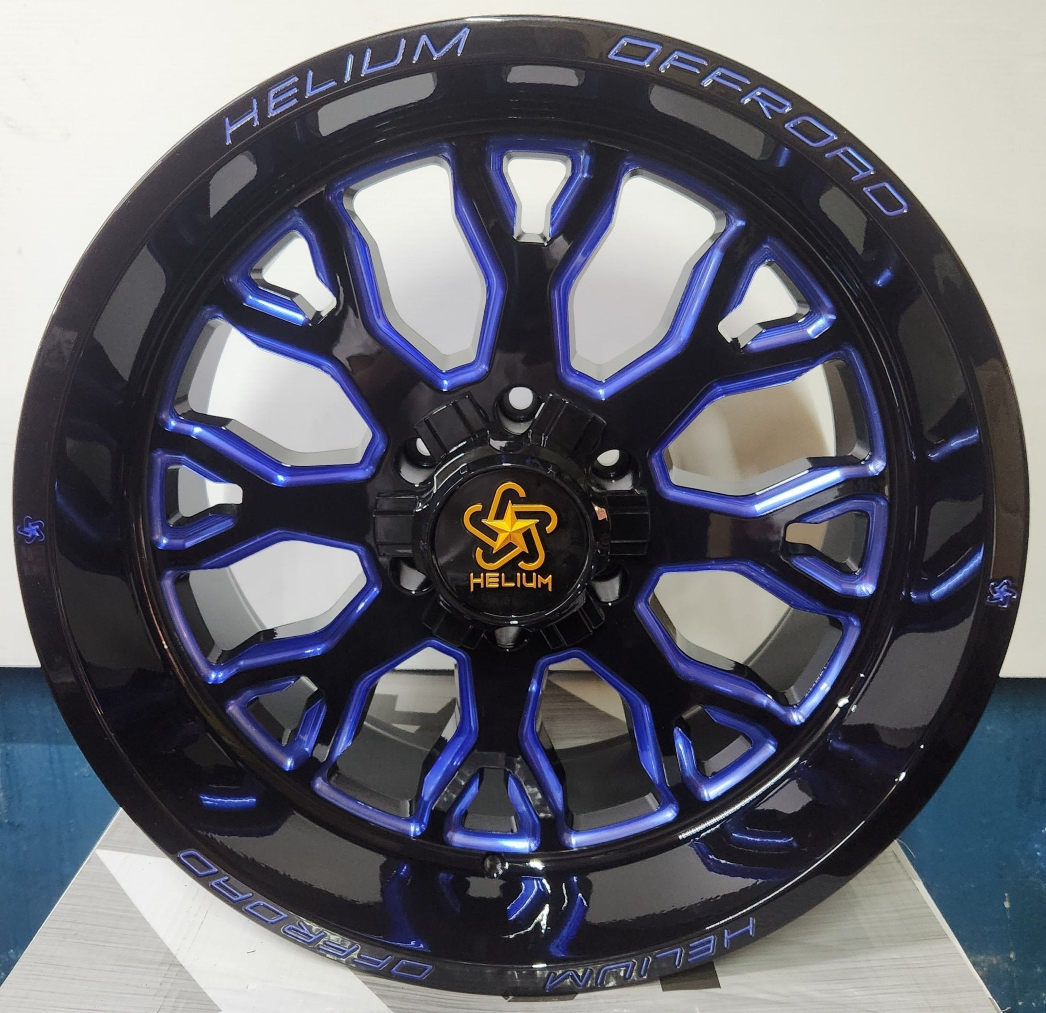 HELIUM HC - 1 - BM 20X10 6X135 6X139.7 PIANO BLACK W/BLUE MILLING - Gun Hill Tire House (WTW - WHOLESALE TIRES & WHEELS)